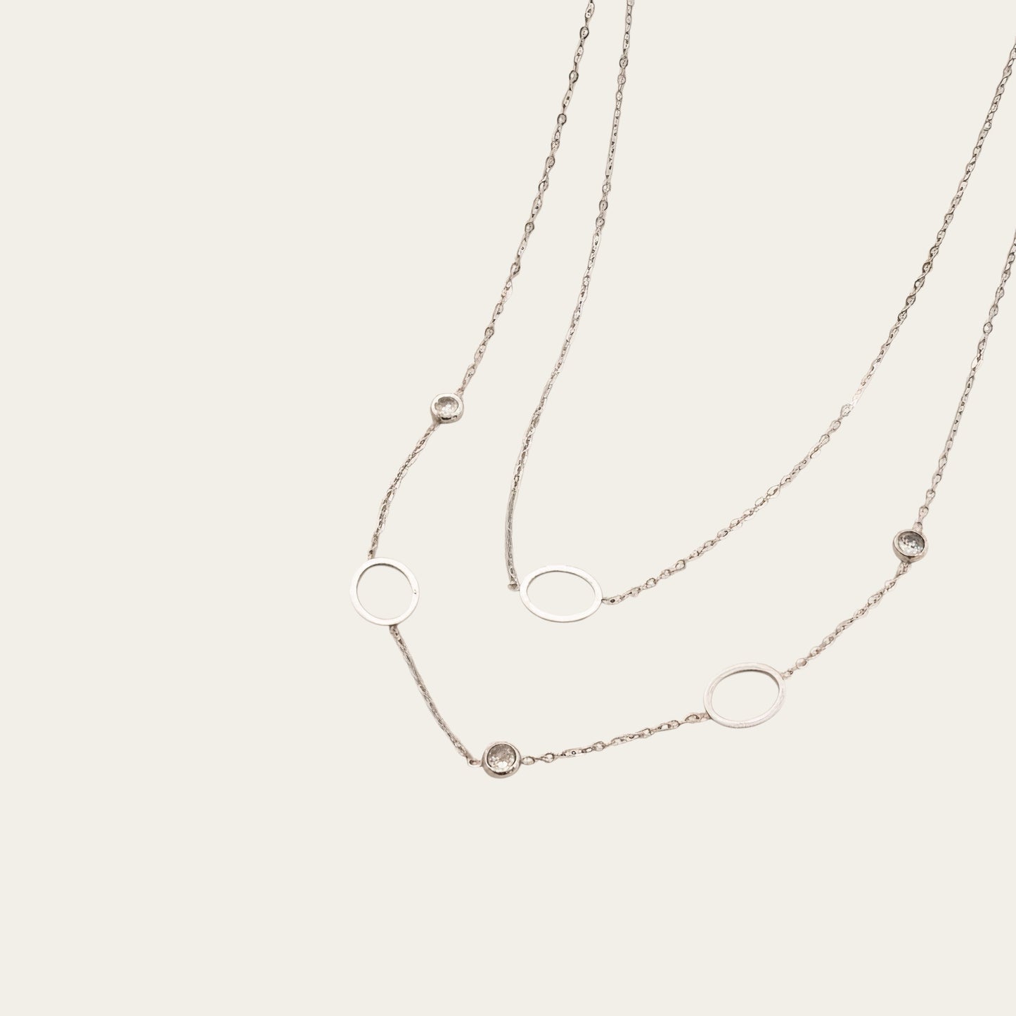 Time4Me silver-tone double chain necklace featuring delicate circular rings and sparkling rhinestone accents
