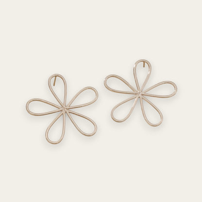 Time4Me silver-tone stainless steel stud earrings featuring a minimalist stylized flower design