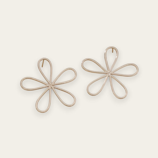Time4Me silver-tone stainless steel stud earrings featuring a minimalist stylized flower design