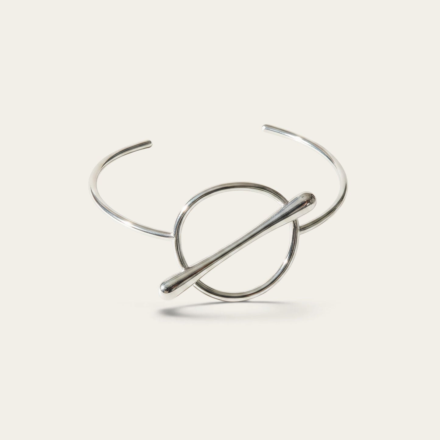 Time4Me silver open cuff bracelet featuring a minimalist geometric circle and bar design in stainless steel.