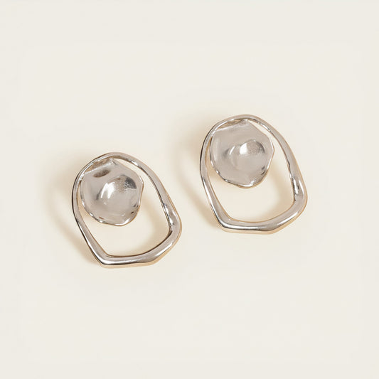 Time4Me silver geometric earrings featuring a hammered circle and irregular mirror-effect frame in stainless steel