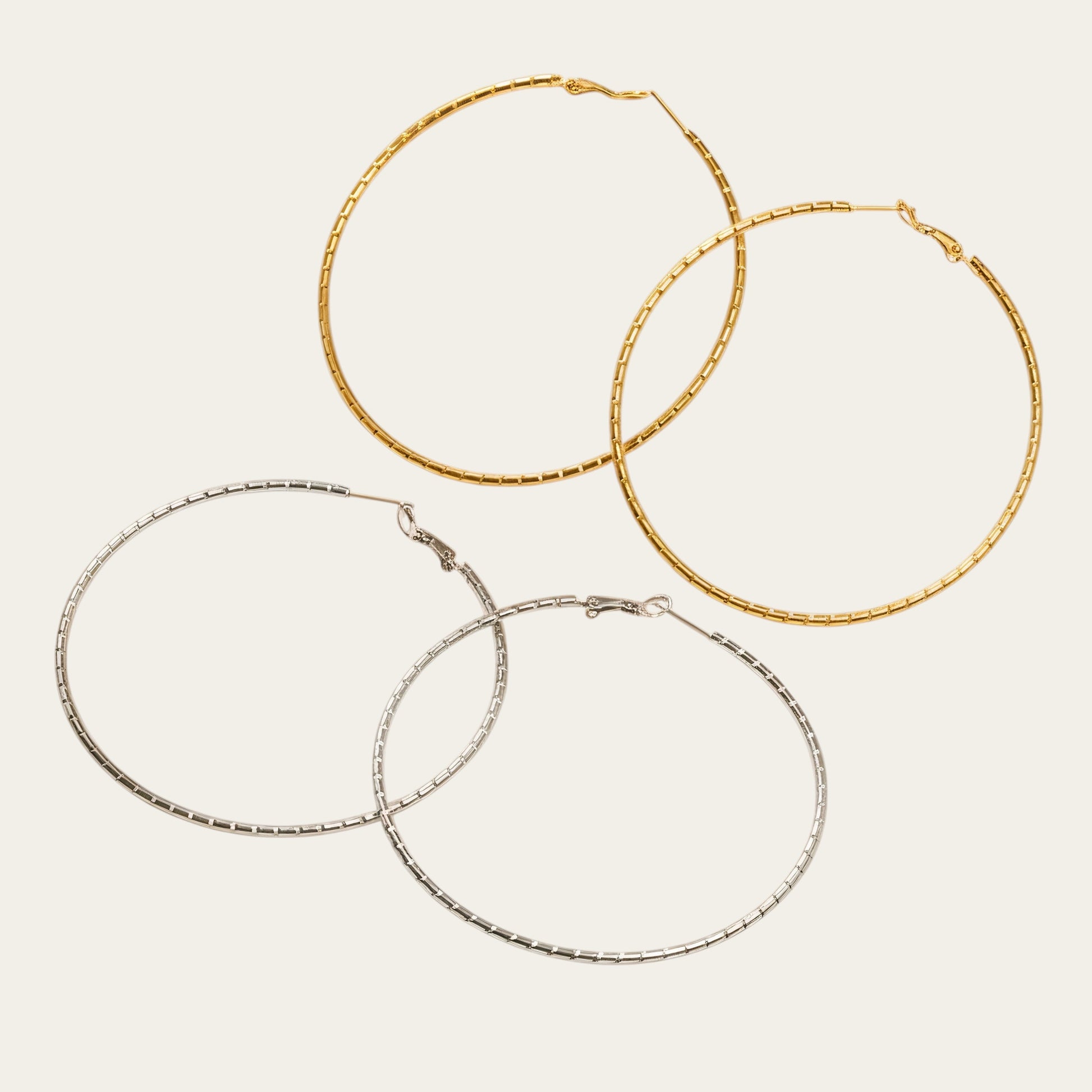 Time4Me large 7 cm hoop earrings in silver and gold stainless steel with a textured link design