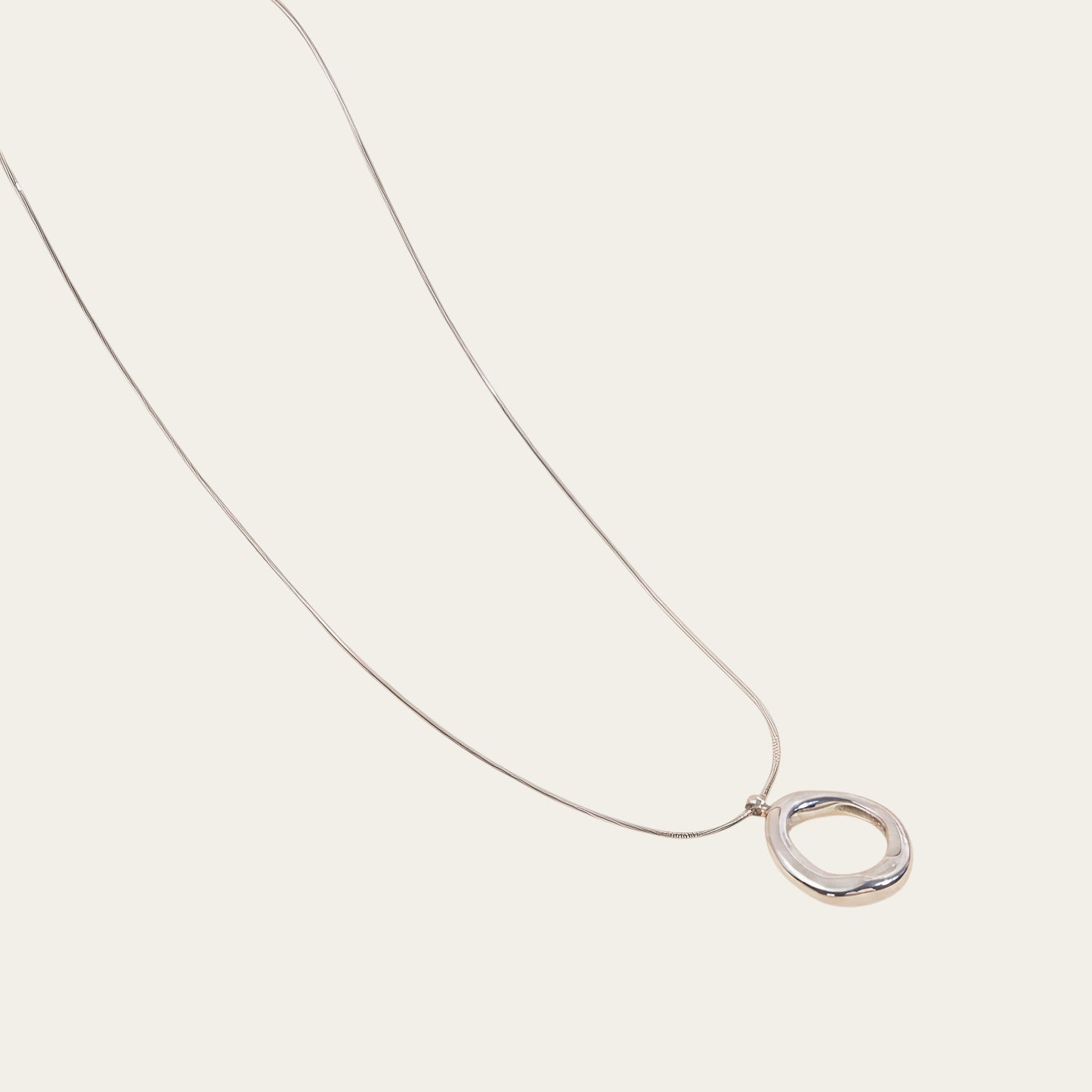 Time4Me silver snake chain necklace featuring a rounded mirror-effect ring pendant made of stainless steel