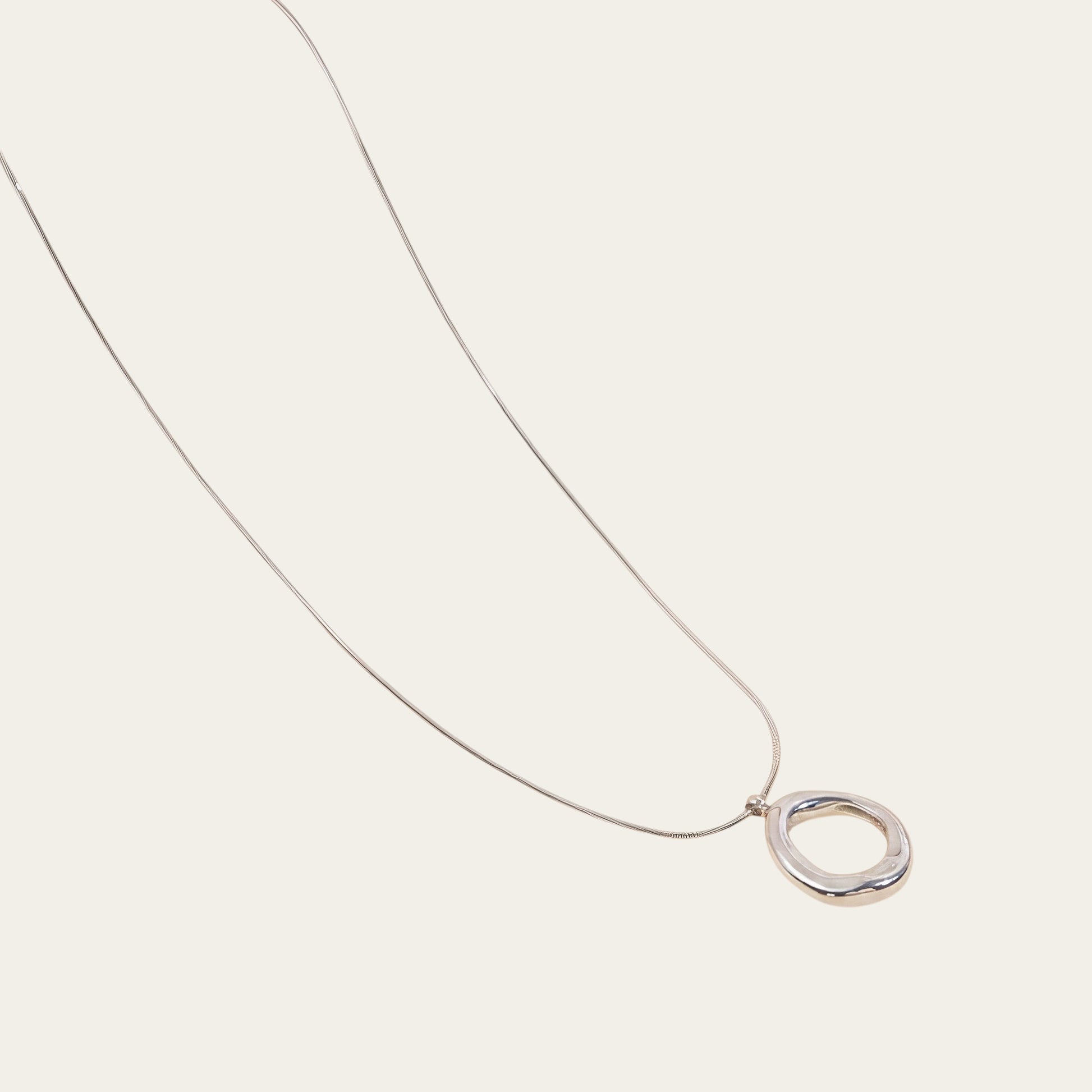 Time4Me silver snake chain necklace featuring a rounded mirror-effect ring pendant made of stainless steel