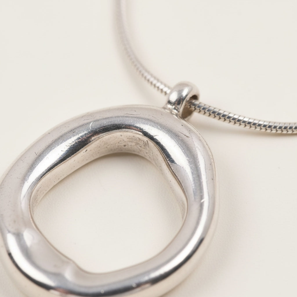 Time4Me silver snake chain necklace featuring a rounded mirror-effect ring pendant made of stainless steel