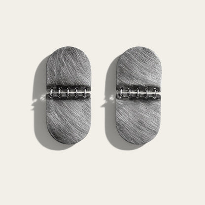 Time4Me silver-toned textured stainless steel oval earrings with a hinged design on a neutral background
