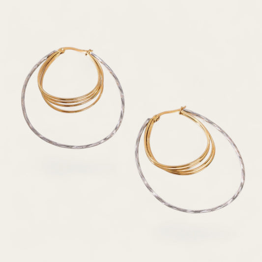 Time4Me two-tone hoop earrings featuring connected oval rings with a textured finish in gold and silver stainless steel