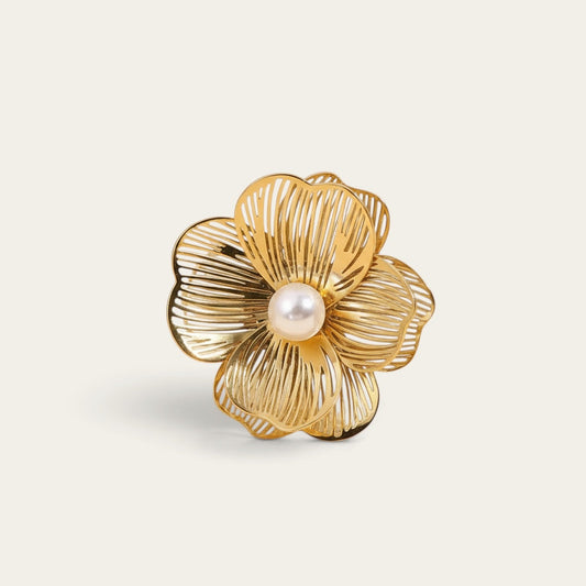 Time4Me vintage gold-tone adjustable ring featuring a delicate openwork flower design with a central pearl accent.