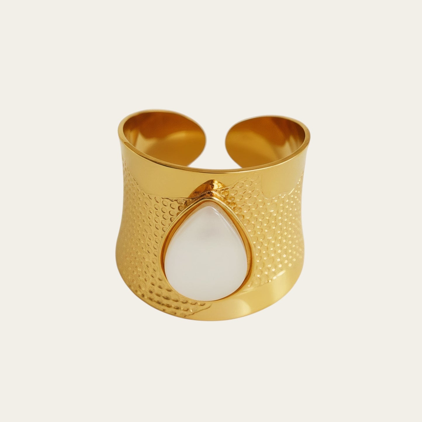 Time4Me wide gold-tone stainless steel adjustable ring featuring a teardrop-shaped white stone and textured finish.