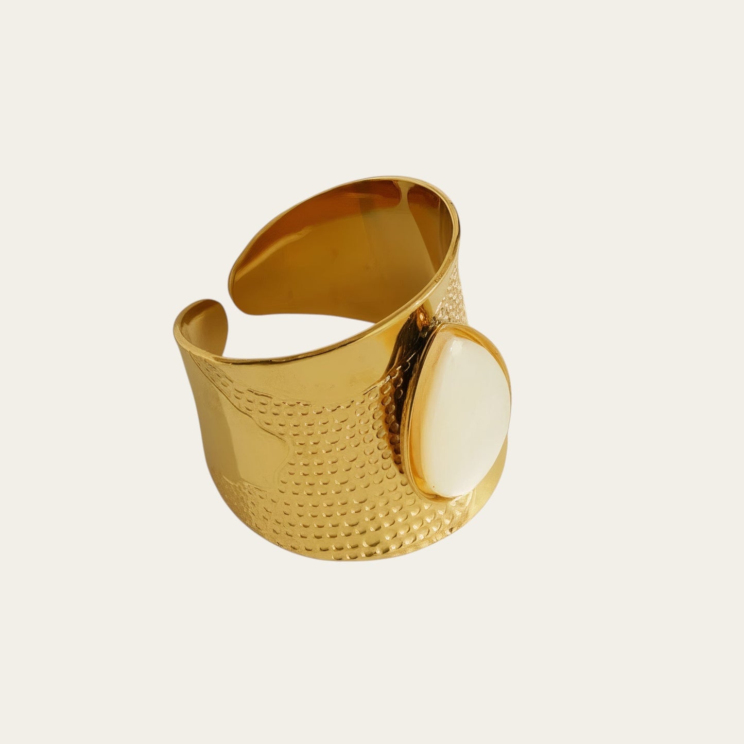 Time4Me wide gold-tone stainless steel adjustable ring featuring a textured band and a smooth white stone accent.