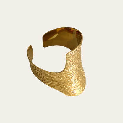 Time4Me wide gold-tone adjustable ring featuring a textured surface with multiple engraved horizontal lines